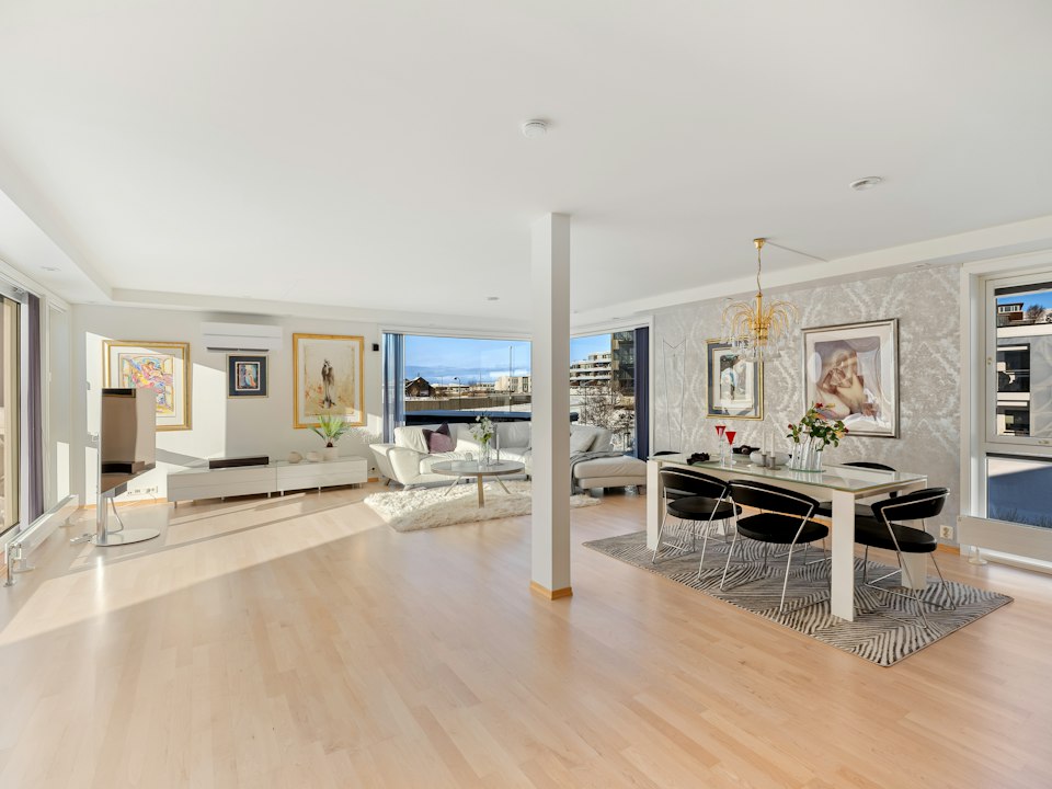 Open living room with warm hardwood floors